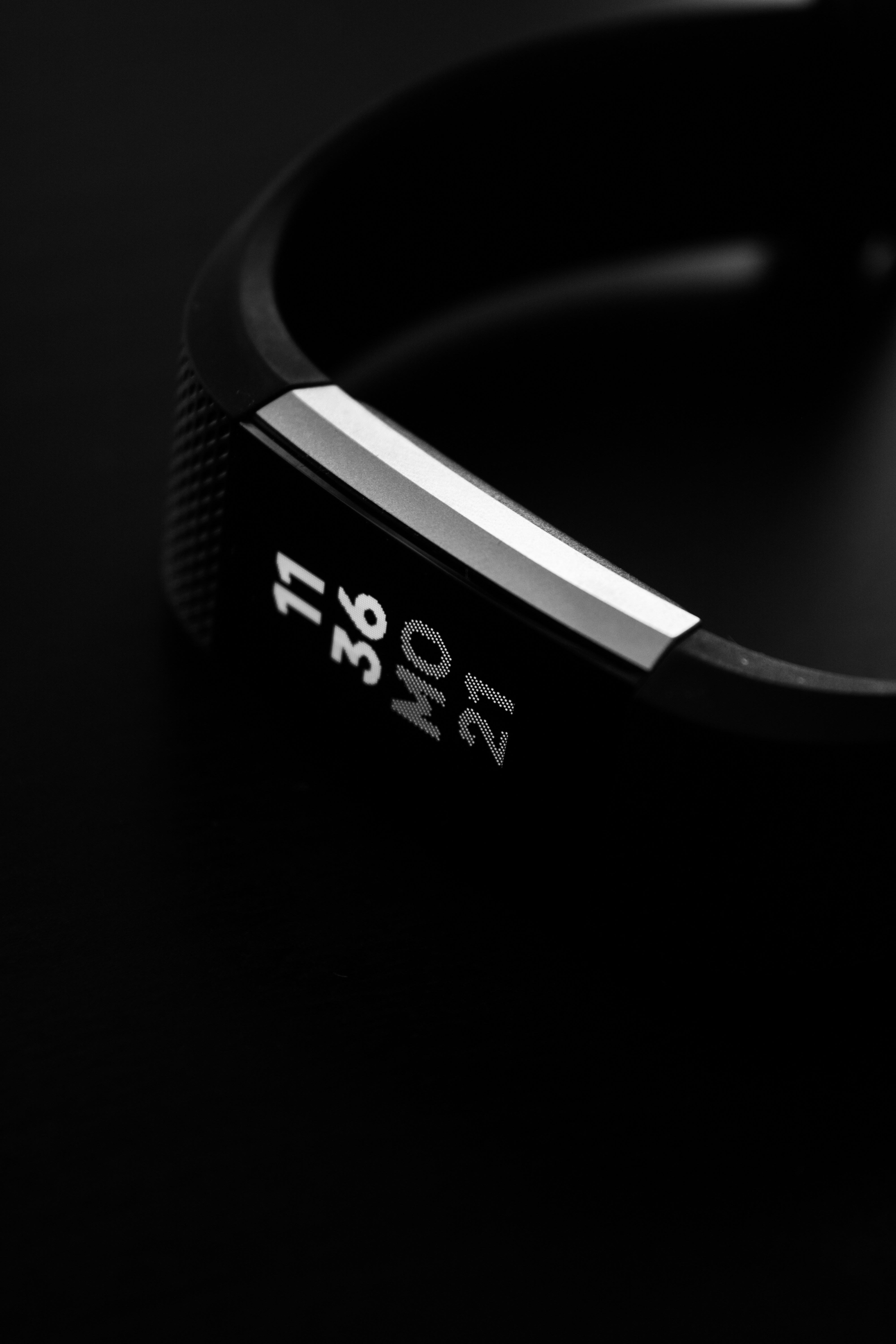 Close-up of studio headphones with a dot-matrix display